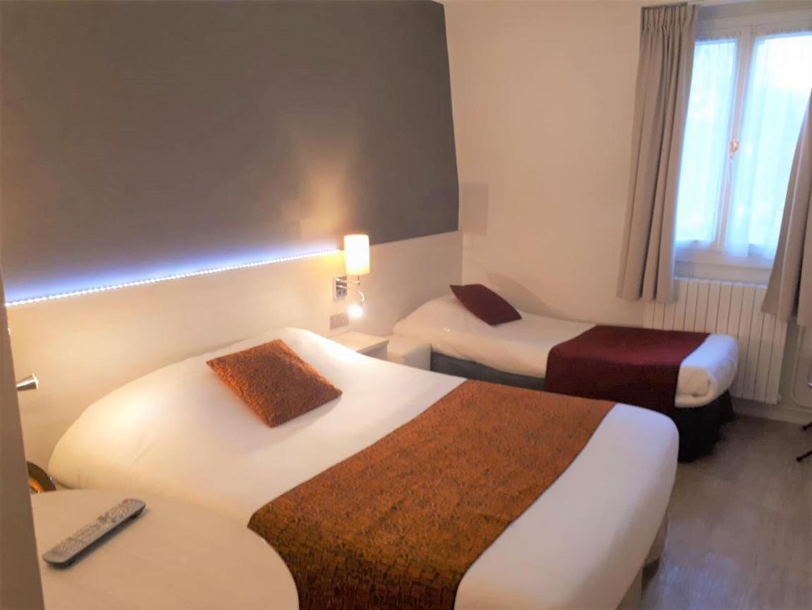 Contact Hotel Du Cerf ชาโต-กงติเยร์ ภายนอก รูปภาพ